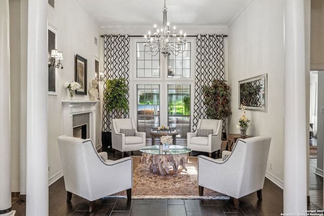 24 Rogers Wood, San Antonio, TX 78248 - living area featuring a chandelier, a fireplace, crown molding, baseboards, and a towering ceiling