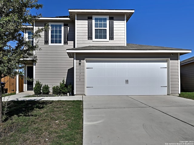 11719 Claudette St, San Antonio, TX 78252 - traditional-style house with concrete driveway and an attached garage