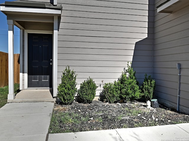 11719 Claudette St, San Antonio, TX 78252 - doorway to property featuring fence