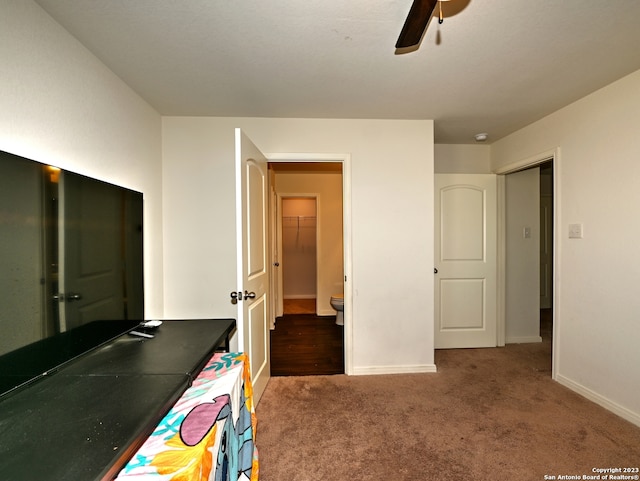 11719 Claudette St, San Antonio, TX 78252 - bedroom with carpet flooring, baseboards, and a ceiling fan
