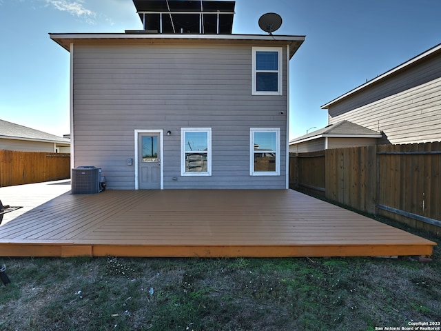 11719 Claudette St, San Antonio, TX 78252 - rear view of property with central air condition unit and a fenced backyard