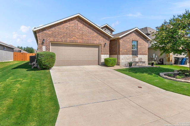 929 Cypress Ml, New Braunfels, TX 78130 - traditional-style home featuring brick siding, stone siding, concrete driveway, and an attached garage