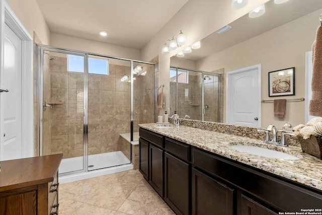929 Cypress Ml, New Braunfels, TX 78130 - bathroom featuring a stall shower, double vanity, and tile patterned floors