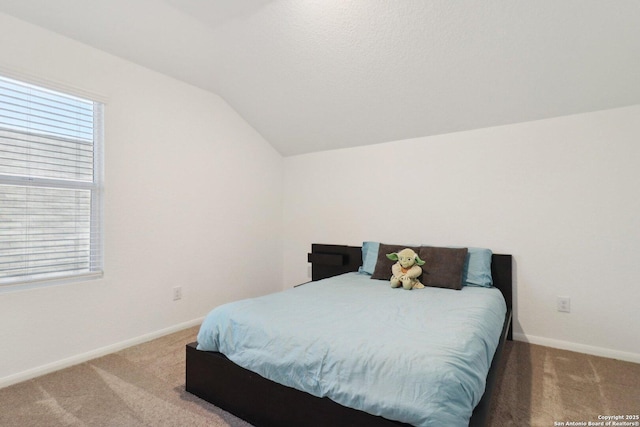 8911 Rancher Pl, Seguin, TX 78155 - bedroom featuring carpet floors, lofted ceiling, and baseboards