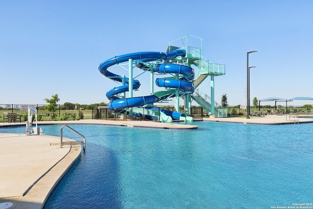 8911 Rancher Pl, Seguin, TX 78155 - community pool with a water slide