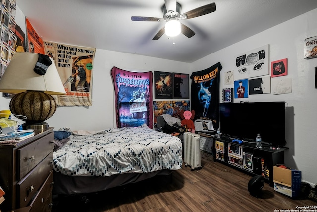 2902 Christian Dr, San Antonio, TX 78222 - bedroom with wood finished floors and a ceiling fan