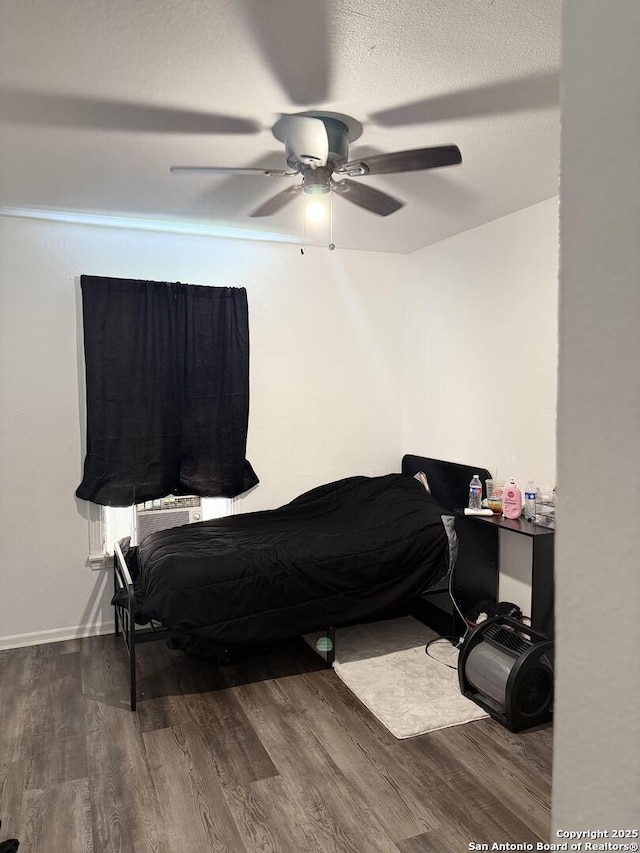 2902 Christian Dr, San Antonio, TX 78222 - bedroom featuring wood finished floors and a ceiling fan