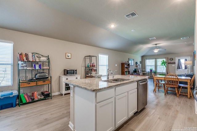 13627 Crossbow, San Antonio, TX 78253 - kitchen with dishwasher, a ceiling fan, a sink, light wood-style flooring, and white cabinets