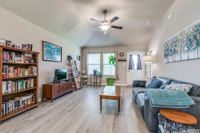 13627 Crossbow, San Antonio, TX 78253 - living room with a ceiling fan, wood finished floors, vaulted ceiling, and baseboards