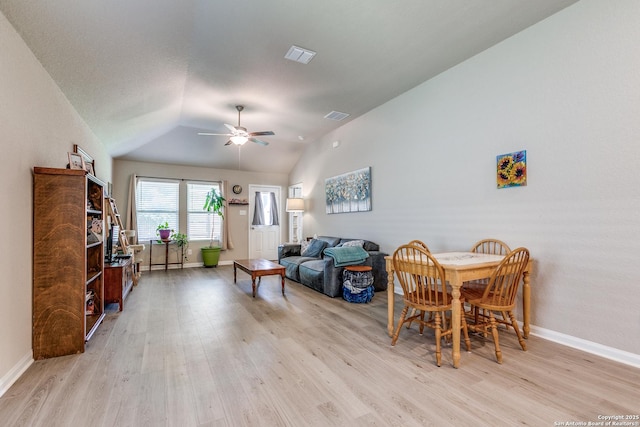 13627 Crossbow, San Antonio, TX 78253 - dining room with a ceiling fan, light wood finished floors, baseboards, and lofted ceiling