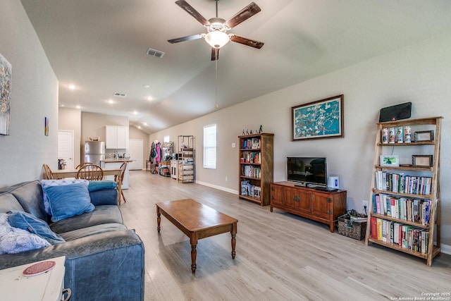 13627 Crossbow, San Antonio, TX 78253 - living room with vaulted ceiling, ceiling fan, light wood-type flooring, baseboards, and recessed lighting