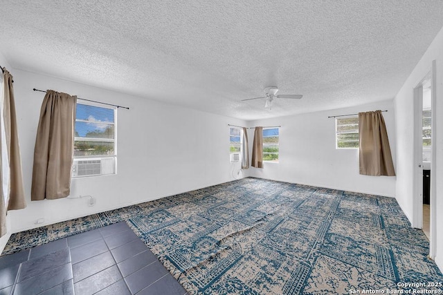 235 Altgelt, San Antonio, TX 78201 - unfurnished room with ceiling fan, a textured ceiling, and cooling unit