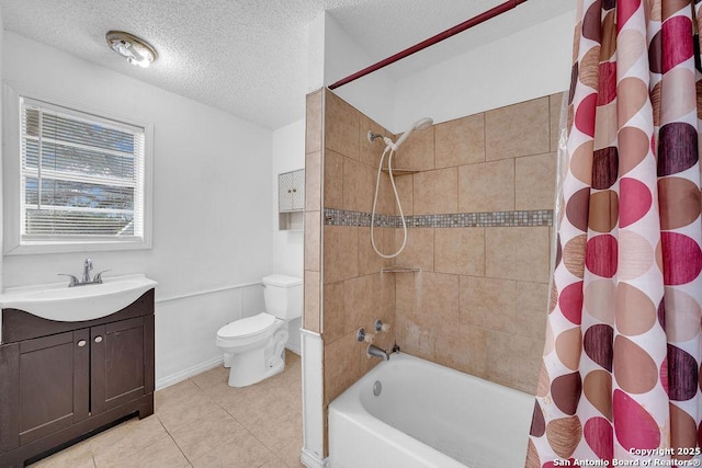 235 Altgelt, San Antonio, TX 78201 - full bath featuring toilet, tile patterned floors, shower / tub combo with curtain, a textured ceiling, and vanity