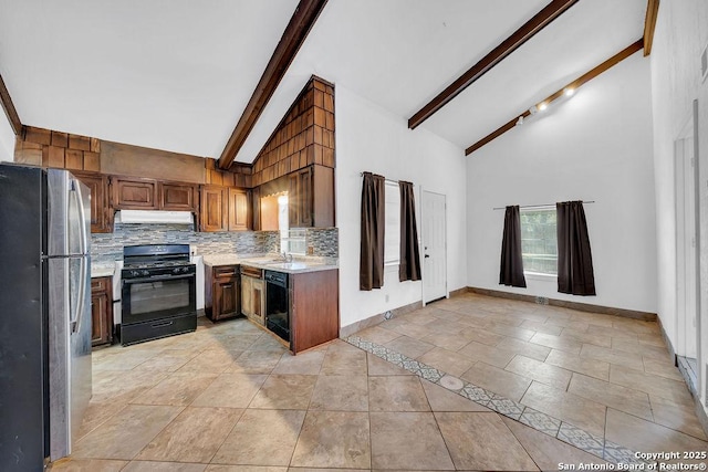 235 Altgelt, San Antonio, TX 78201 - kitchen featuring black appliances, under cabinet range hood, backsplash, high vaulted ceiling, and beamed ceiling