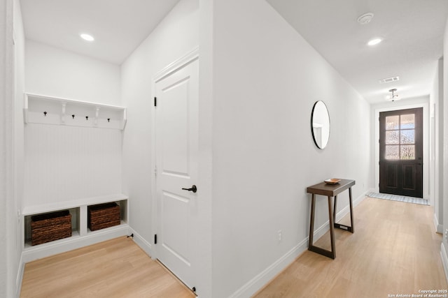 mudroom featuring light wood-type flooring, baseboards, and recessed lighting