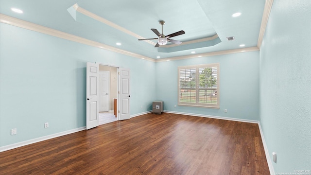 24935 Pecan Crk, San Antonio, TX 78255 - unfurnished bedroom with ornamental molding, a raised ceiling, wood finished floors, recessed lighting, and baseboards