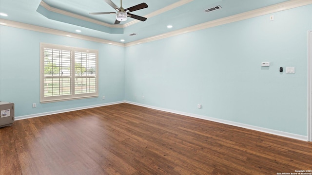 24935 Pecan Crk, San Antonio, TX 78255 - unfurnished room featuring a tray ceiling, crown molding, a ceiling fan, dark wood-type flooring, and recessed lighting