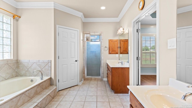 24935 Pecan Crk, San Antonio, TX 78255 - full bath featuring a stall shower, two vanities, a bath, crown molding, and tile patterned flooring