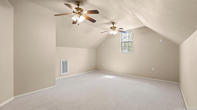 24935 Pecan Crk, San Antonio, TX 78255 - bonus room with carpet floors, vaulted ceiling, baseboards, and a ceiling fan