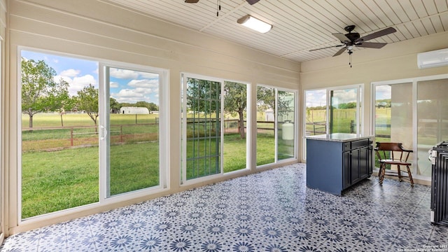 24935 Pecan Crk, San Antonio, TX 78255 - sunroom featuring ceiling fan, a wall mounted AC, and healthy amount of natural light