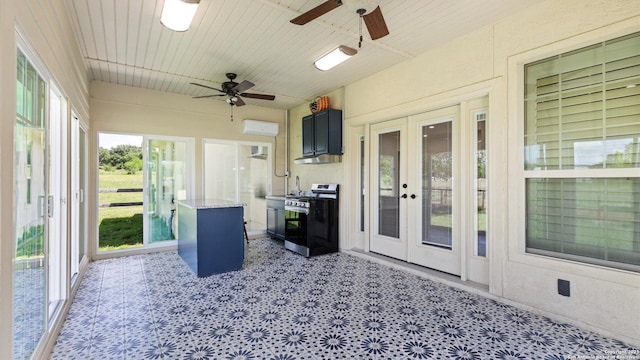 24935 Pecan Crk, San Antonio, TX 78255 - sunroom featuring french doors, a wall unit AC, and a sink