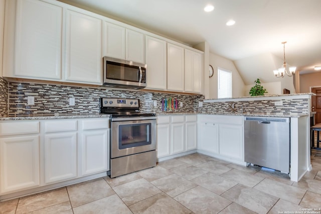 414 Harvest Pt, Selma, TX 78154 - kitchen with stainless steel appliances, tasteful backsplash, a peninsula, lofted ceiling, and white cabinets