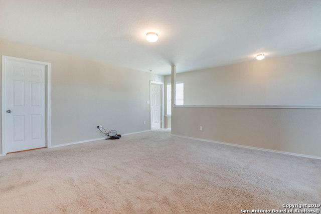 414 Harvest Pt, Selma, TX 78154 - carpeted empty room with baseboards