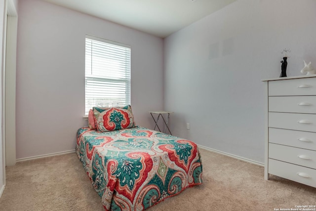 414 Harvest Pt, Selma, TX 78154 - carpeted bedroom featuring multiple windows and baseboards