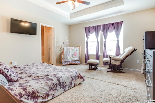 414 Harvest Pt, Selma, TX 78154 - carpeted bedroom with a tray ceiling, crown molding, and a ceiling fan