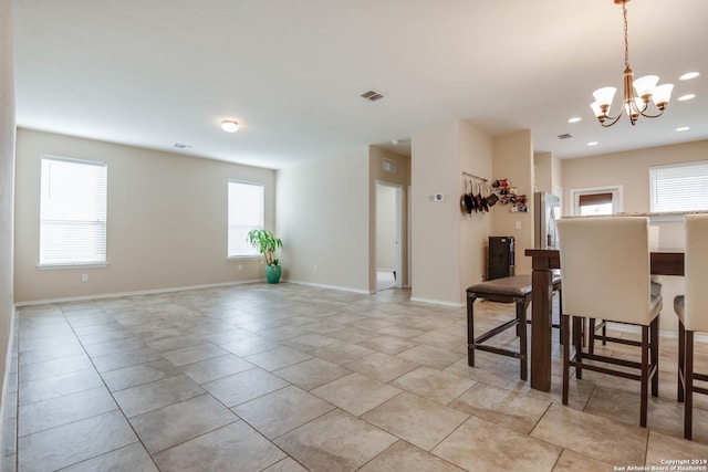 414 Harvest Pt, Selma, TX 78154 - dining space with healthy amount of natural light, a chandelier, recessed lighting, light tile patterned floors, and baseboards