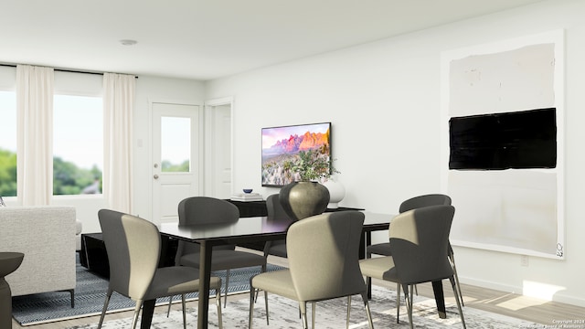 10249 Ickham Mill Ct, San Antonio, TX 78254 - dining space featuring baseboards and light wood finished floors