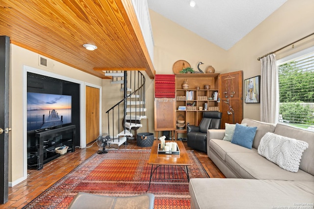 635 Brightwood Pl, San Antonio, TX 78209 - living area featuring stairs, brick flooring, and lofted ceiling