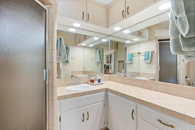 635 Brightwood Pl, San Antonio, TX 78209 - full bath featuring a stall shower, vanity, and recessed lighting