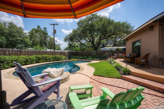 635 Brightwood Pl, San Antonio, TX 78209 - view of swimming pool with a patio, a fenced backyard, and an outdoor hangout area