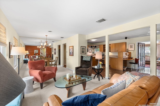 635 Brightwood Pl, San Antonio, TX 78209 - living area featuring a chandelier and carpet floors