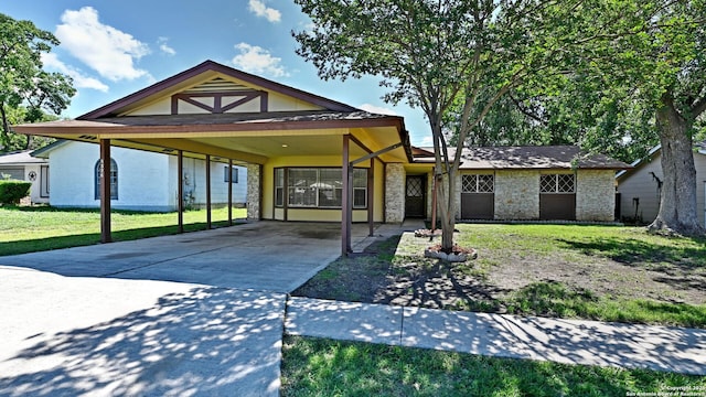 8526 Glen Breeze, San Antonio, TX 78239 - view of front of home with a front yard, concrete driveway, and an attached carport
