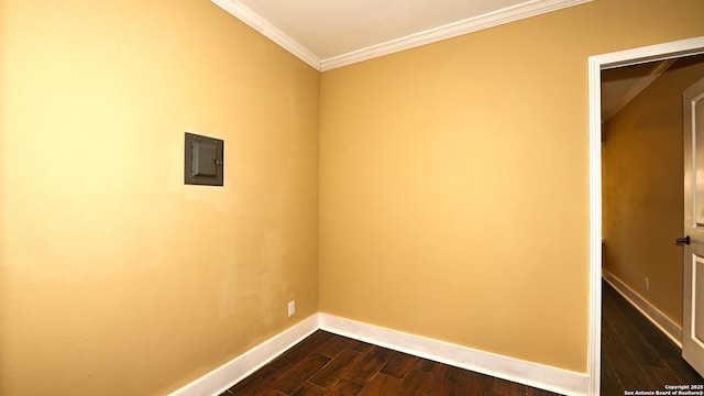 8526 Glen Breeze, San Antonio, TX 78239 - empty room featuring baseboards, dark wood-style floors, crown molding, and electric panel