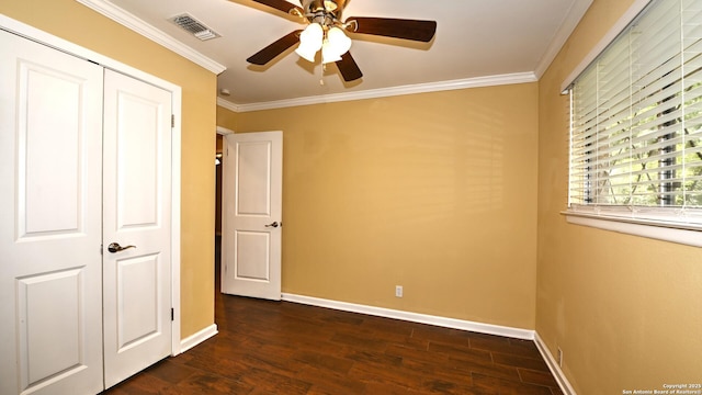 8526 Glen Breeze, San Antonio, TX 78239 - unfurnished bedroom with wood finished floors, baseboards, ornamental molding, a ceiling fan, and a closet