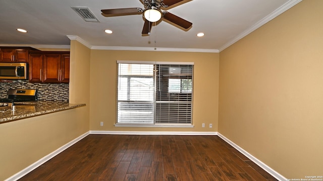 8526 Glen Breeze, San Antonio, TX 78239 - unfurnished dining area with baseboards, ceiling fan, dark wood-style flooring, ornamental molding, and recessed lighting