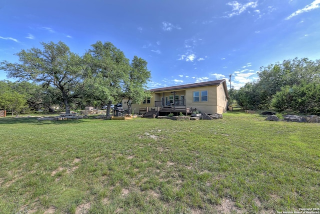 211 Comal Run, Bulverde, TX 78163 - view of green lawn with a deck