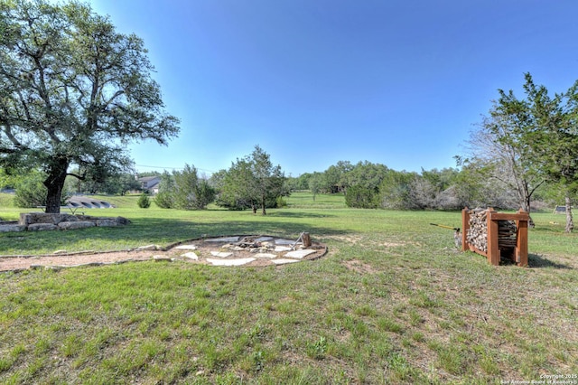 211 Comal Run, Bulverde, TX 78163 - view of grassy yard featuring a fire pit