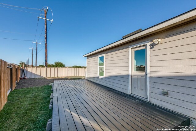 11715 Claudette St, San Antonio, TX 78252 - wooden deck with a fenced backyard
