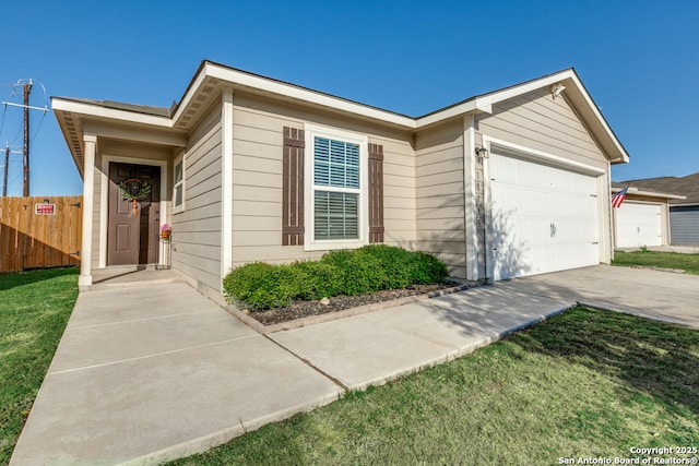 11715 Claudette St, San Antonio, TX 78252 - single story home featuring fence, an attached garage, and driveway