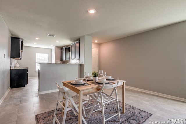 11715 Claudette St, San Antonio, TX 78252 - dining area featuring baseboards and recessed lighting