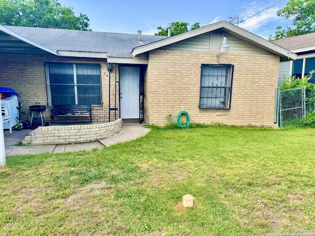 941 Potomac, San Antonio, TX 78202 - view of front of house with brick siding and roof with shingles