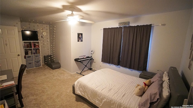 bedroom with carpet floors and a ceiling fan