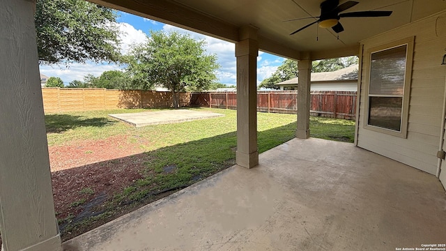 view of patio featuring ceiling fan