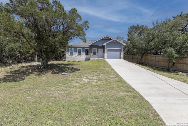 1407 Tanglewood, Spring Branch, TX 78070 - view of front facade featuring a garage and concrete driveway