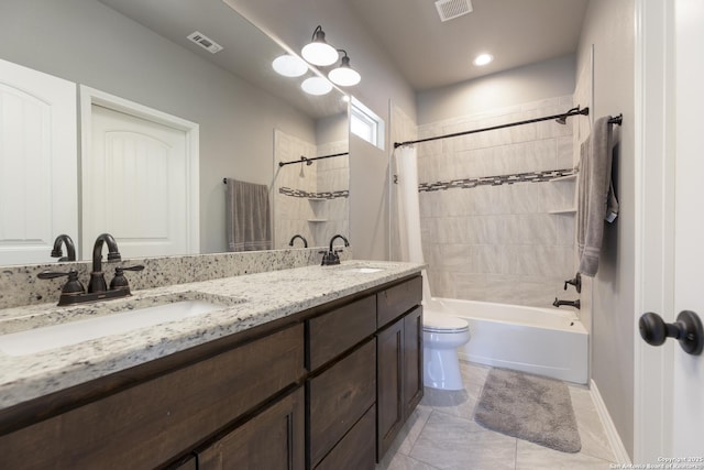 1407 Tanglewood, Spring Branch, TX 78070 - bathroom with shower / bath combo, double vanity, toilet, baseboards, and tile patterned flooring