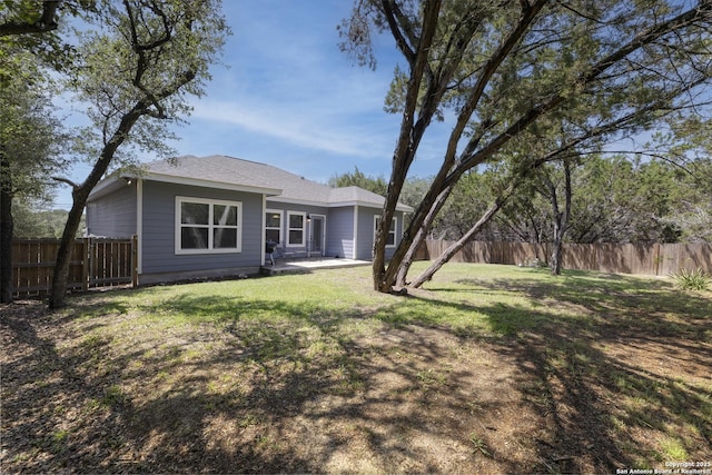1407 Tanglewood, Spring Branch, TX 78070 - rear view of property with a patio area